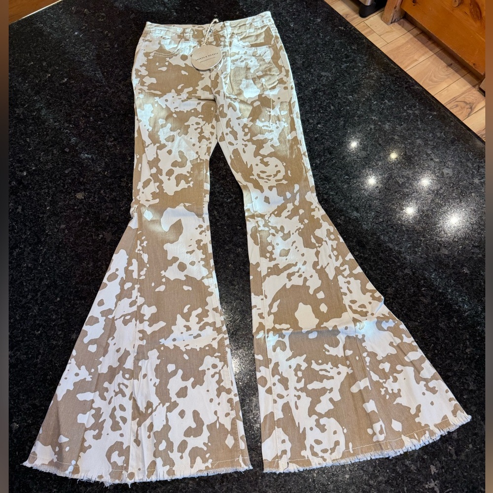 Tan and White Cow Print Flare Jeans